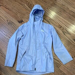 The North Face purple girls hooded rain jacket. Size M (10/12).